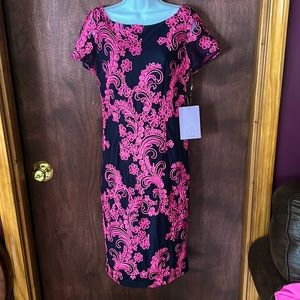JS collection dress size 8. Black and pink sheer sleeves. Beautiful dress.